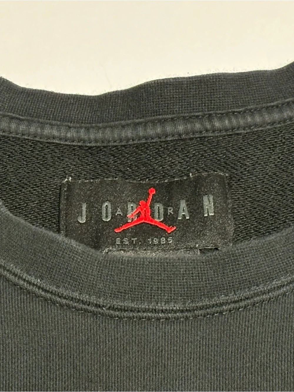 Jordan Black Crewneck Sweater with Gold Accents
